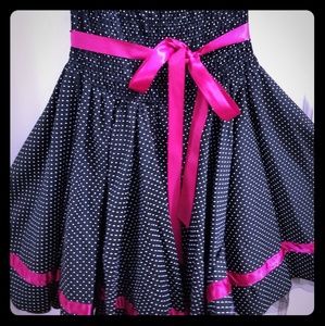 Strappless black polkadot dress